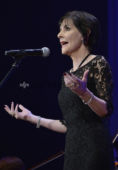 Irish singer Enya sings during a charity auction event that support children who was affected by the March 2011 earthquake and tsunami, in Tokyo, March 22, 2016. JIJI PRESS PHOTO / MORIO TAGA
